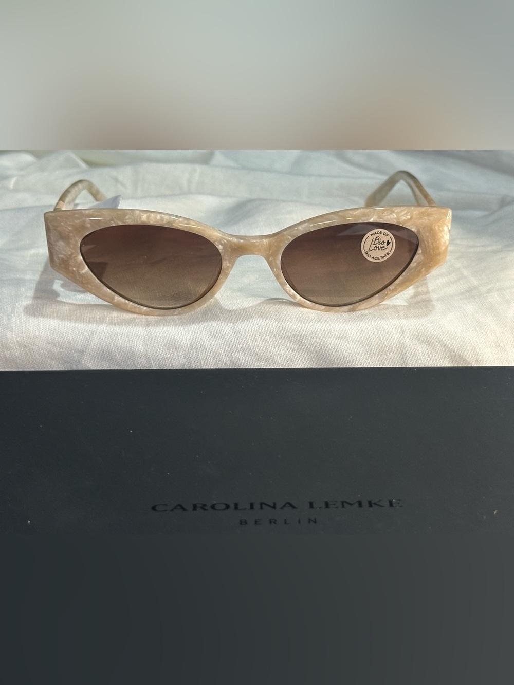 7. NEW Carolina Lemke Berlin Cream Marbled Cat-Eye Sunglasses